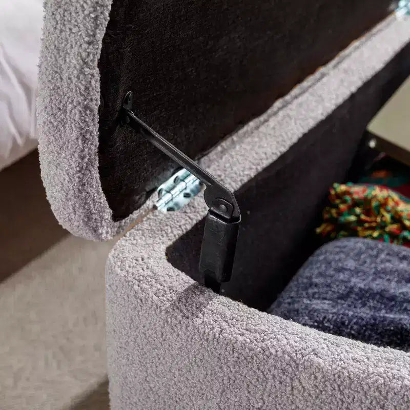Pouffe de rangement moderne avec coussin d'assise en fausse fourrure